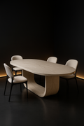 Aether — Oval Corian Dining Table in a dark luxury setting