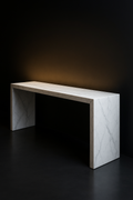 Basalt — Waterfall Entryway Console in a dark luxury setting