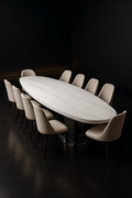 Basalt — Boat-Shaped Corian Dining Table in a dark luxury setting