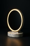 Cascade — Round LED Vanity Mirror in a dark luxury setting