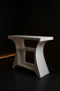 Crescent — Sculptural Pedestal Console in a dark luxury setting