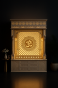 Elegant Large Corian Altar with Golden Glow Om and Ample Storage in a dark luxury setting