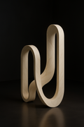Halo — Sculptural Floor Art Piece in a dark luxury setting