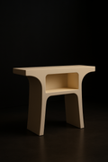 Halo — Sculptural Pedestal Console in a dark luxury setting