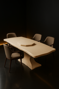 Halo — Live-Edge Organic Corian Dining Table in a dark luxury setting