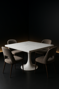 Linea — Square Corian Dining Table in a dark luxury setting
