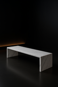 Linea — Low Media Bench in a dark luxury setting