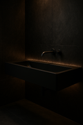 Lotus — Trough-Basin Vanity in a dark luxury setting