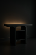 Lotus — Sculptural Pedestal Console in a dark luxury setting