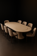 Mirage — Racetrack Corian Dining Table in a dark luxury setting
