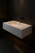 Monolith — Single-Basin Floating Vanity in a dark luxury setting