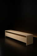 Nimbus — Low Media Bench in a dark luxury setting