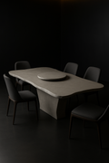 Noir — Live-Edge Organic Corian Dining Table in a dark luxury setting