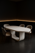 Plinth — Oval Corian Dining Table in a dark luxury setting