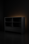 Serra — Console Bookshelf in a dark luxury setting