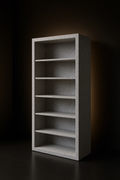 Vela — Freestanding Corian Bookcase in a dark luxury setting