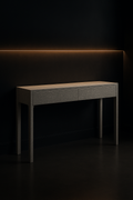 Vela — Slim Hallway Console in a dark luxury setting